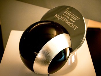 Award trophy made of two half-spheres reading "McDermott"