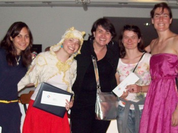 Five women pose for a photo.