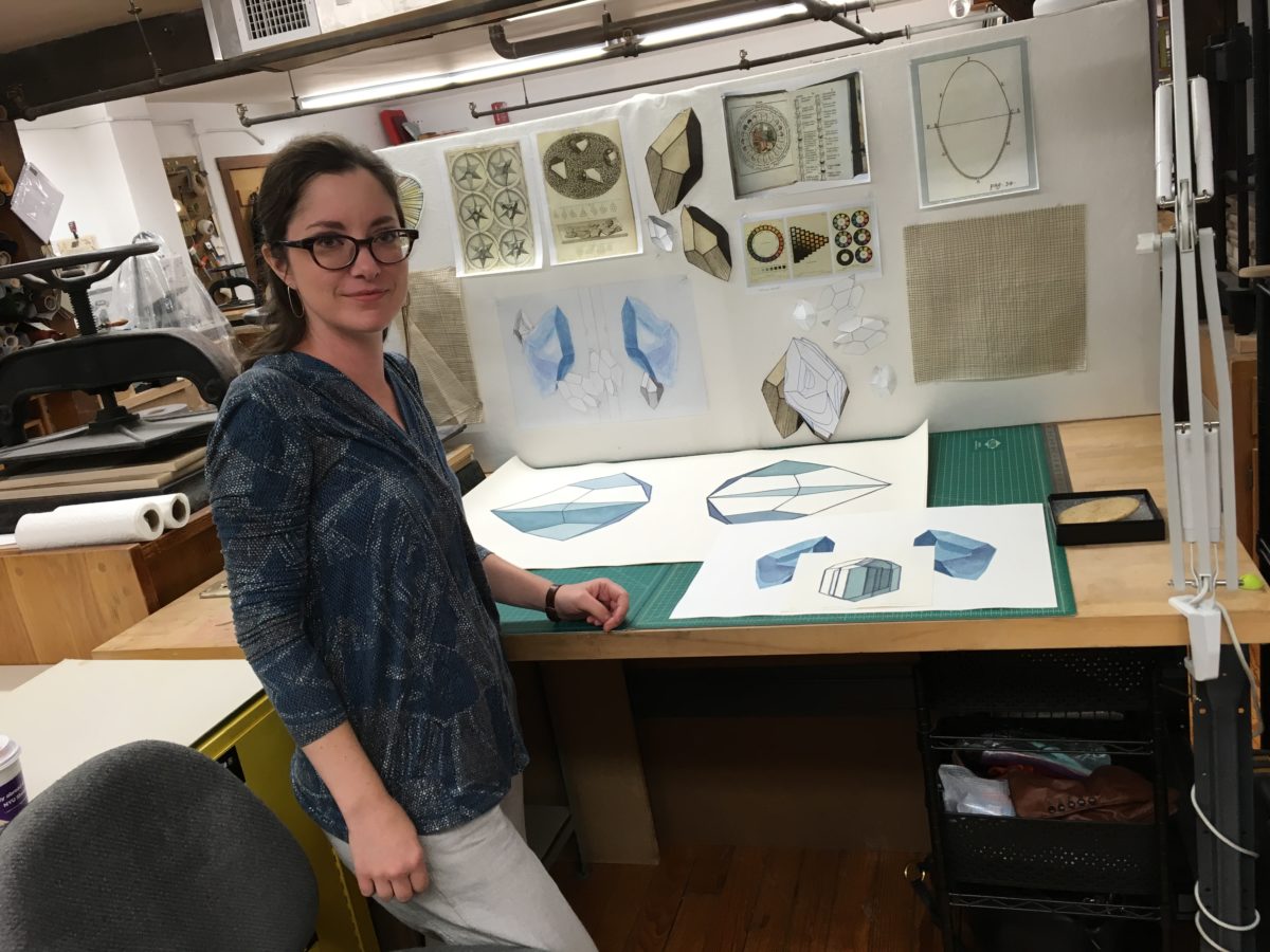 Sarah Hulsey in her studio. On desk, Stereosyntax , 2017. Photo: Sharon Lacey.