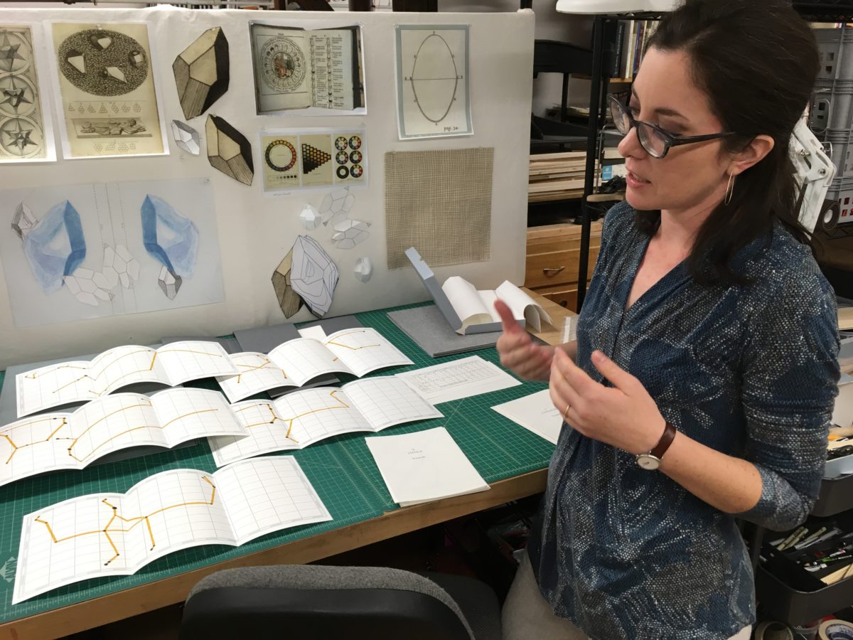 Sarah Hulsey in her studio. On desk, Asterisms, 2017. Photo: Sharon Lacey.