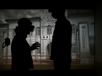 Two participants wearing vr goggles in Po-Hao Chi's Virtual Confinement